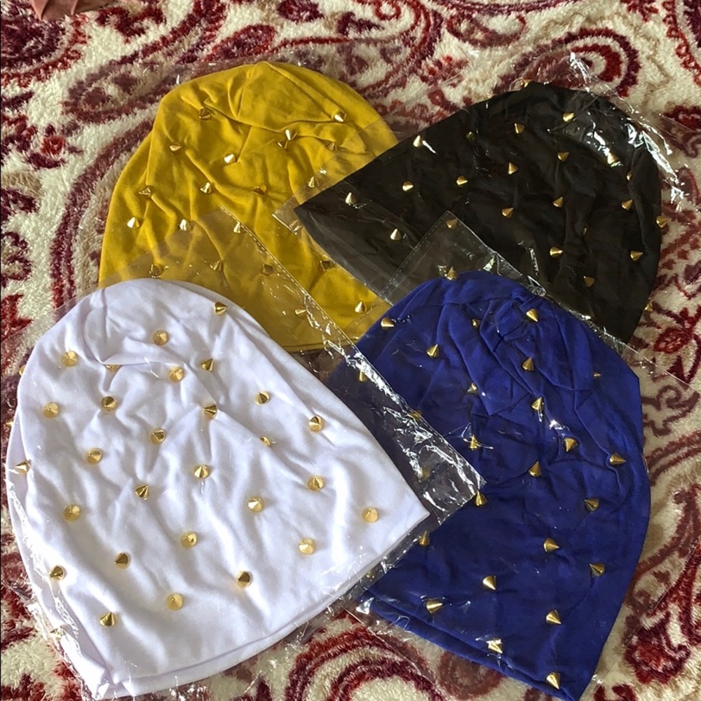 NWT stretchable beanies with spike studs. OS